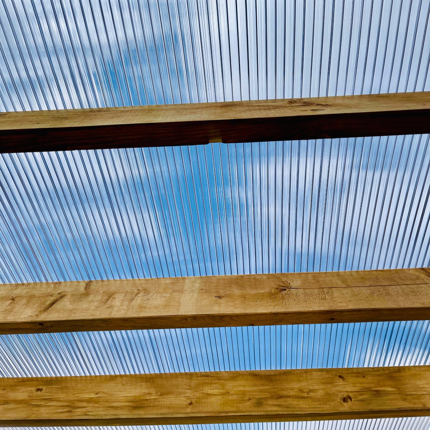 Close-up of lightweight triple wall polycarbonate panel showing inner structure