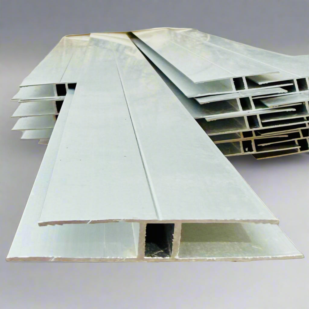 Close-up of aluminum H connector ends showing interlocking profile