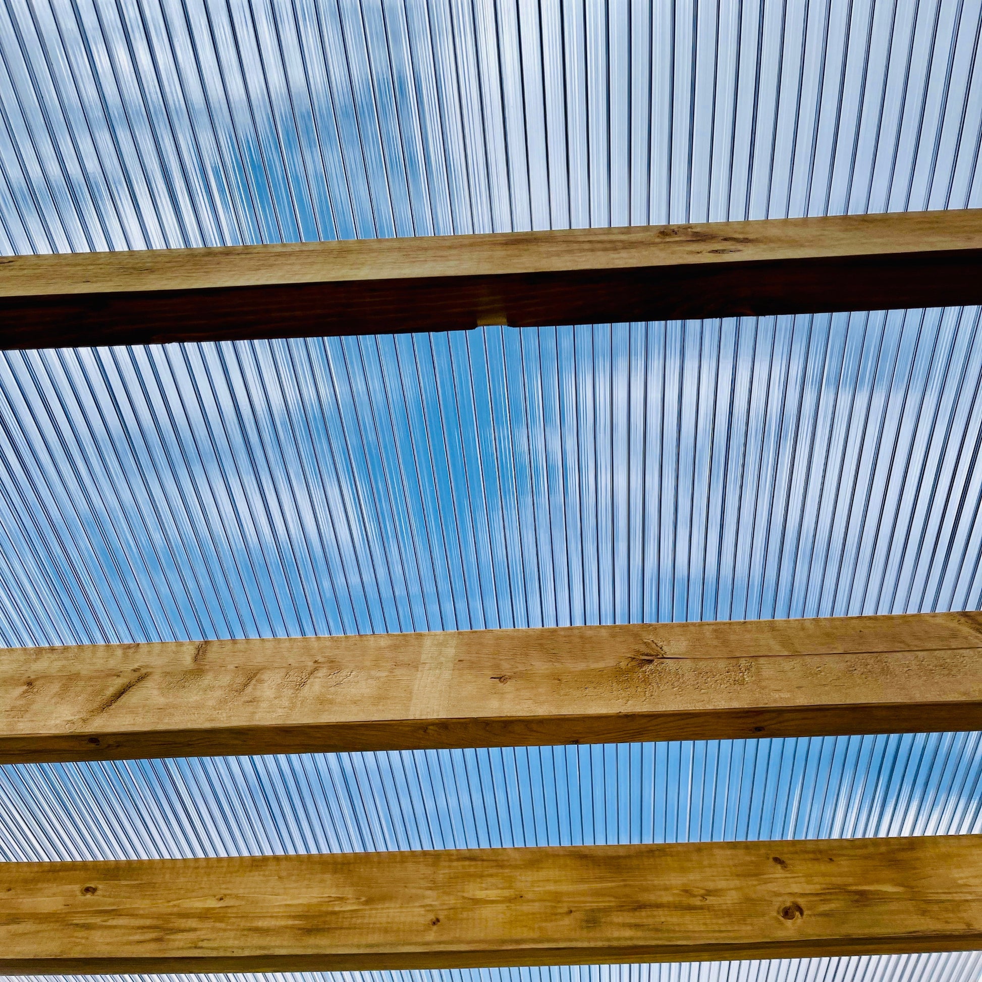 Close-up of lightweight triple wall polycarbonate panel showing inner structure