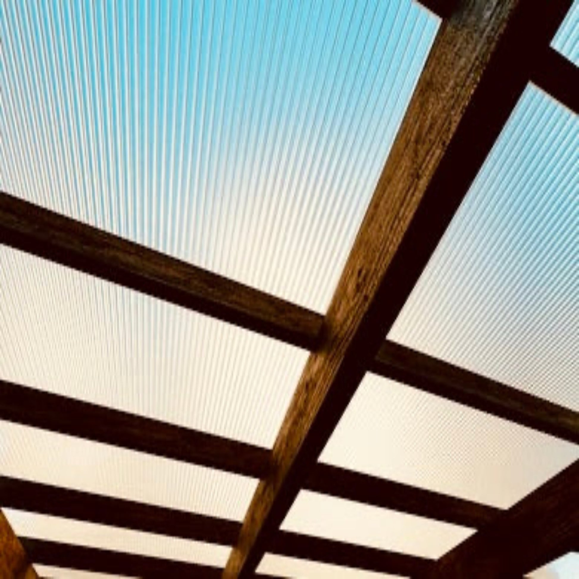 Wavy ribbed polycarbonate panel for outdoor use